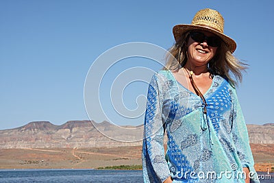 Smiling woman in sun hat