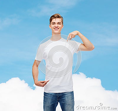 Smiling young man in blank white t-shirt