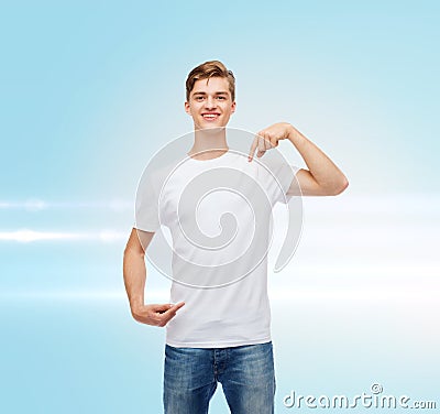 Smiling young man in blank white t-shirt