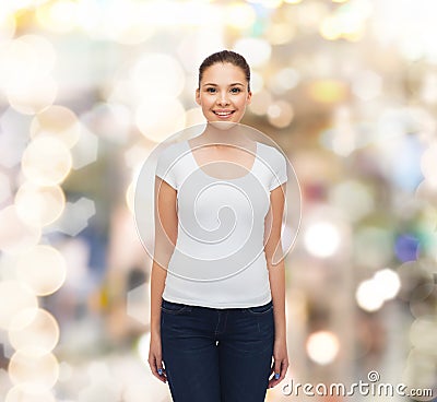 Smiling young woman in blank white t-shirt