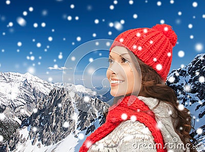 Smiling young woman in winter clothes