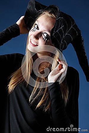 Smiling zombie girl with black tears and cut throat in hat