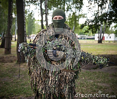 Sniper of Ukrainian Armed Forces in camouflage in National Guard