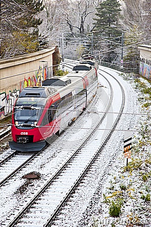 Snow covered rails in the city