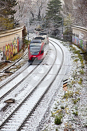 Snow covered rails in the city