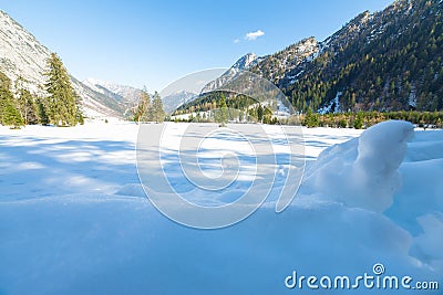 Snow fall early winter and late autumn. Alps landscape with snow capped mountains in the late autumn season.