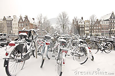 Snowy bikes in Amsterdam the Netherlands