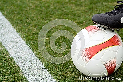 Soccer ball and a boot