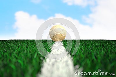 Soccer ball on field with sky background