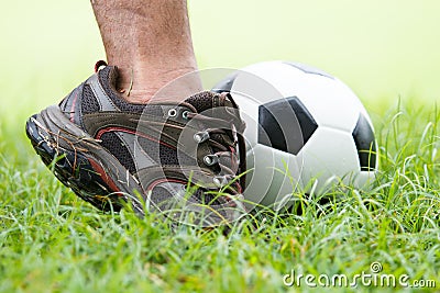 Soccer ball with his feet