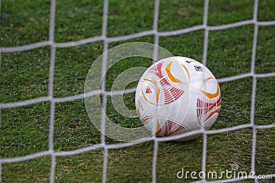 Soccer ball inside the net