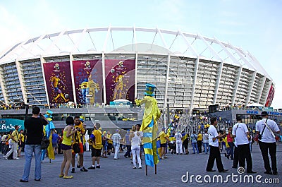 Soccer fans go to the Olympic stadium in Kyiv