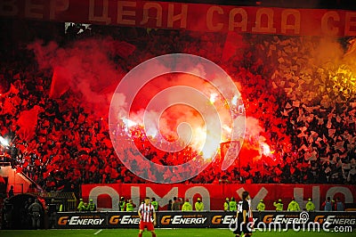 Soccer or football fans using pyrotechnics