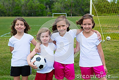 Soccer football kid girls team at sports fileld