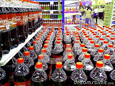 Soda drink plastic bottles inside a grocery store