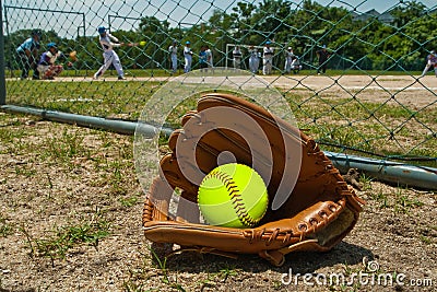 Softball and glove