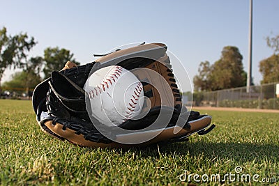 Softball in leather glove