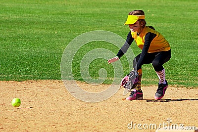 Softball Player Fielding a Ground Ball