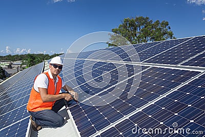 Solar panels with technician