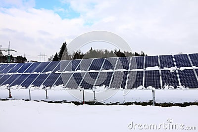 Solar Power Station in the snowy winter Nature
