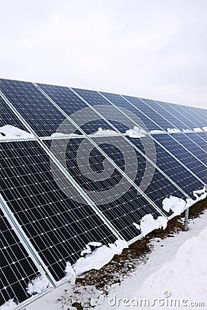 Solar Power Station in the snowy winter Nature