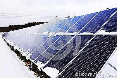 Solar Power Station in the snowy winter Nature