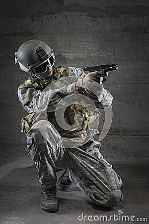 Soldier aiming a pistol