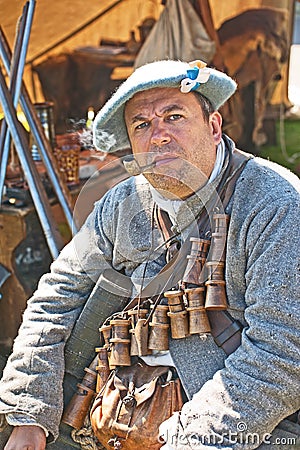 Soldier smoking clay pipe