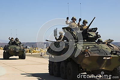 Soldiers in armored vehicles