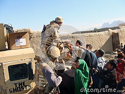 Soldiers sharing food in Afghanistan