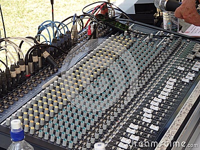 A sound mixer at the mount gay music fest on bequia
