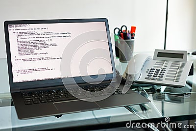 Source code on a software developer laptop