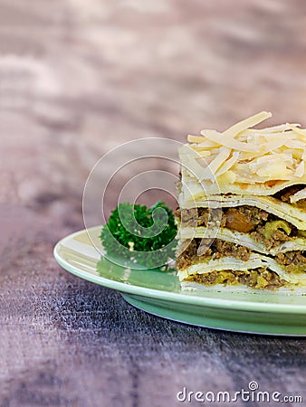 South African bobotie dish layered with pancakes