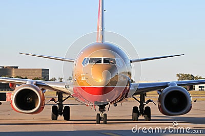 A Southwest Airlines airplane pulling into the gat