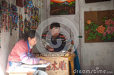 Souvenirs made of wood from handmade shop in Dayan old town.