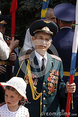 Soviet Army veteran with little girl