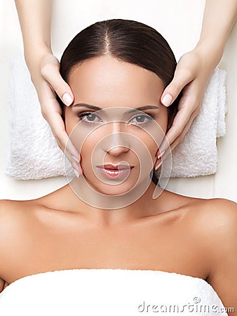 Spa Woman. Close-up of a Young Woman Getting Spa Treatment. Face