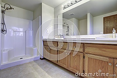 Spacious bathroom interior with open shower