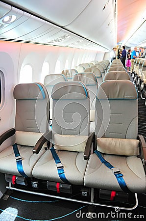 Spacious economy class of a Boeing 787 Dreamliner with dynamic LED lighting at Singapore Airshow 2012