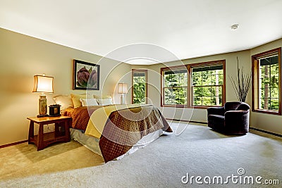 Spacious master bedroom with comfortable bed