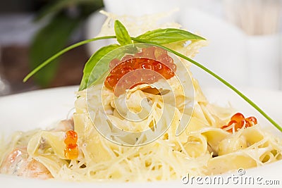 Spaghetti with caviar and seafood