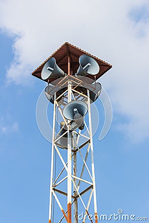 Speaker on high tower clear blue sky
