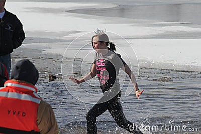 Special Olympics Nebraska Polar Plunge Miss Nebraska Contestant leaving the water