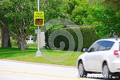 Speed radar sign with warning message to driver