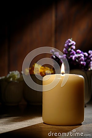 Spiritual Reflection Pillar Candle Softly Burning