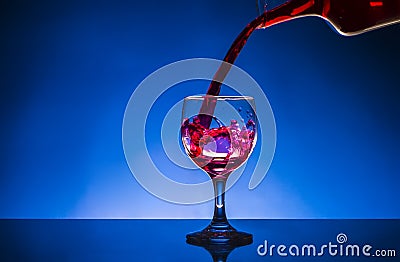 Splash glass red wine