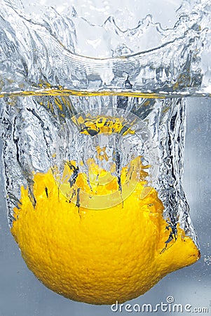 Splashing lemon into a water