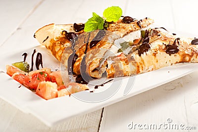 Sponge Pancakes with cheese, fruit, chocolate and mint