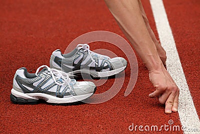 Sports shoes and line of start