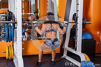 Sports woman in the gym.